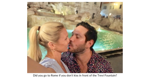 Broad World and boyfriend share a kiss in front of the Trevi Fountain in Rome.